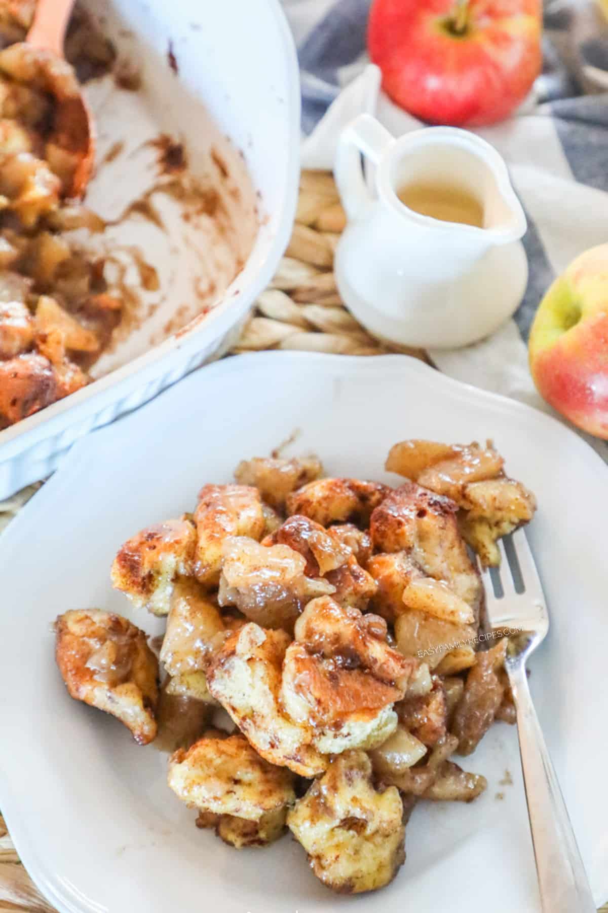 Apple Fritter Christmas Breakfast Casserole on a plate with a fork