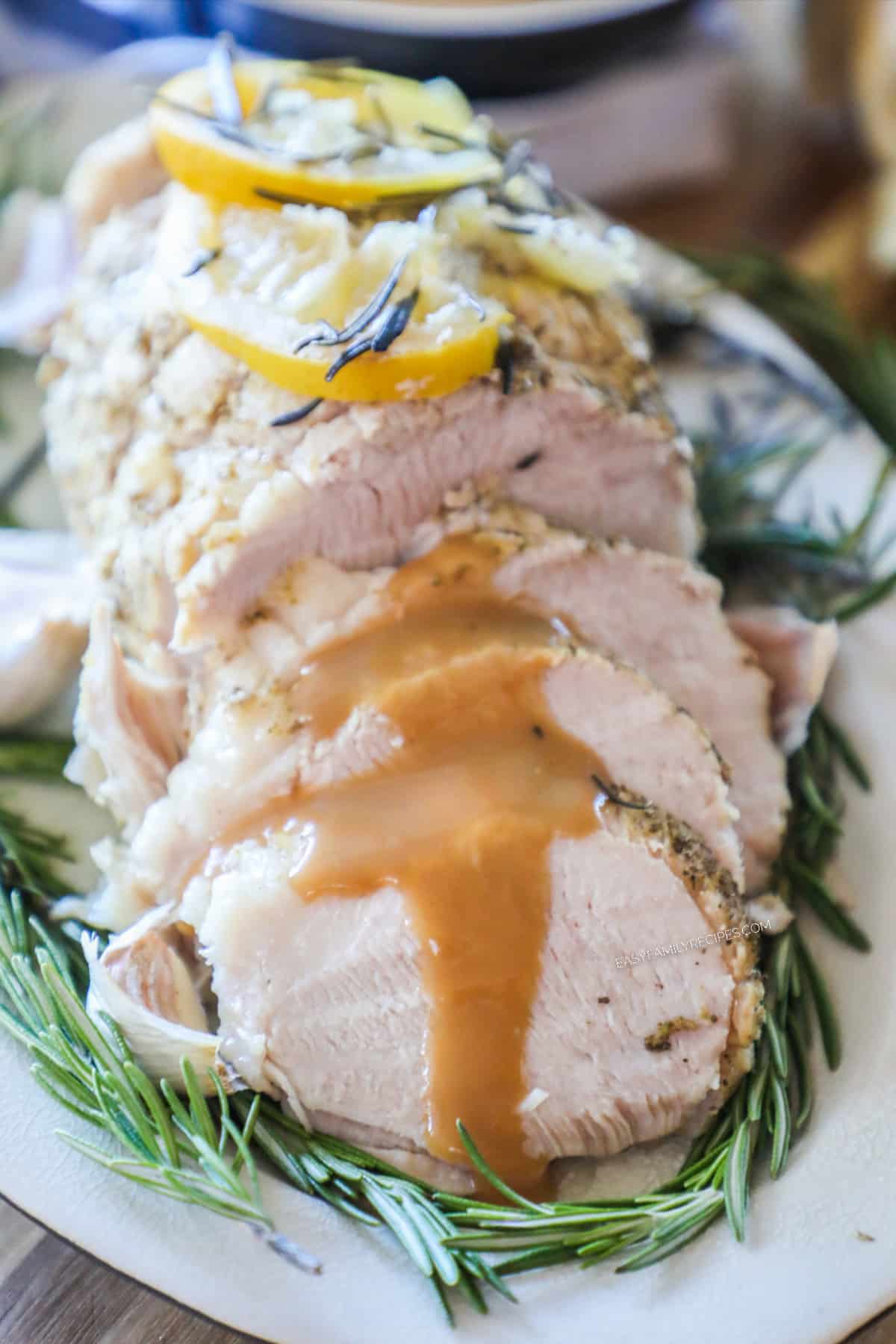 Turkey breast made in the Instant Pot and placed on a serving platter.