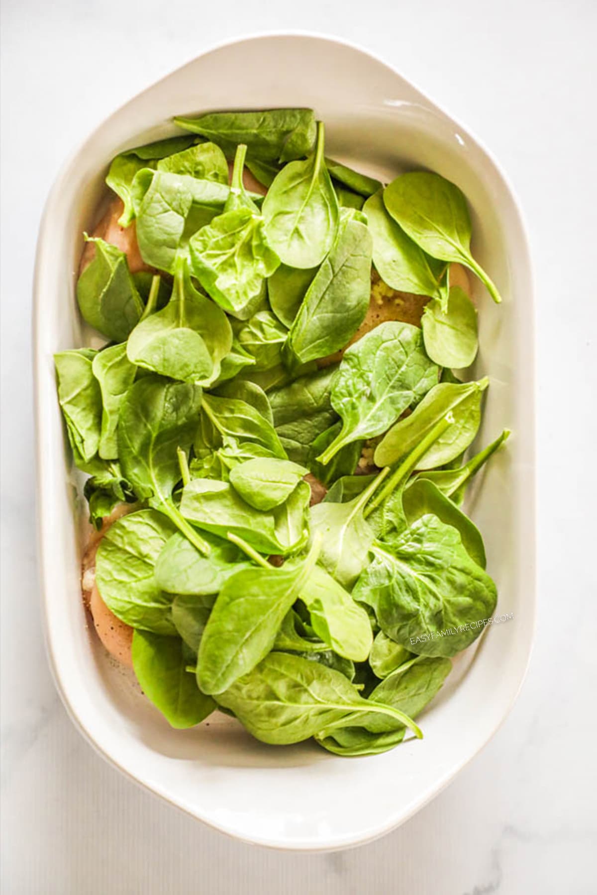 Steps for making tuscan garlic chicken - Step 2: add spinach