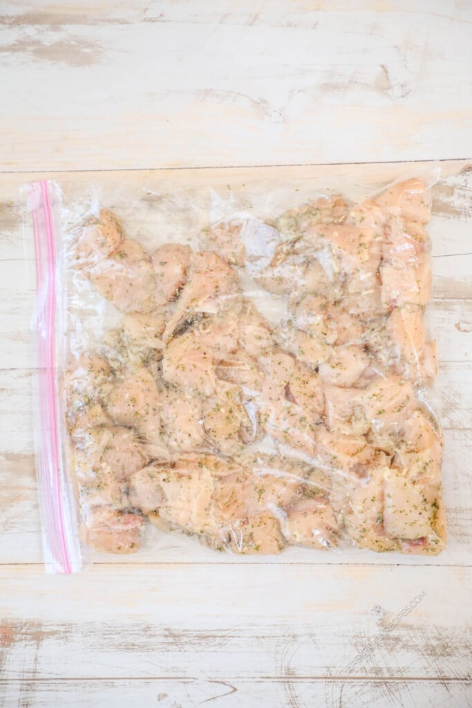 How to Make Ranch Chicken Bites Step 3: Place chicken with oil and ranch seasoning in a bag to marinate.