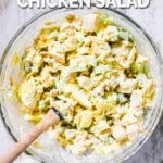 Curry chicken salad after being mixed in a bowl.