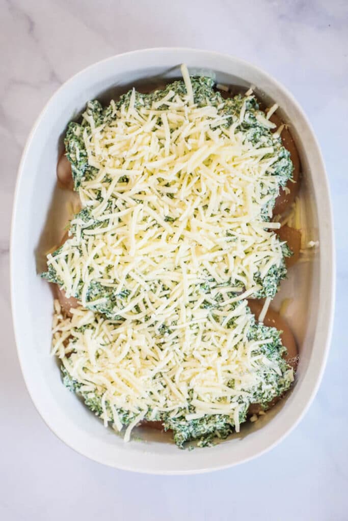How to make Spinach and Feta Chicken Step 3: Cover chicken with mozzarella cheese.