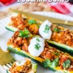 Taco zucchini boats served on a plate.