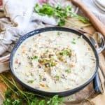 Crock Pot Chicken Wild Rice Soup Recipe plated in a bowl with parsley
