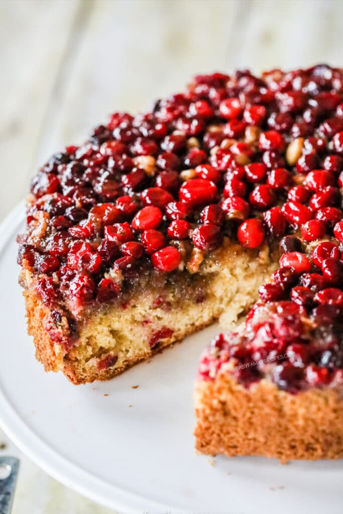 Whole Cranberry Christmas Cake on a platter.