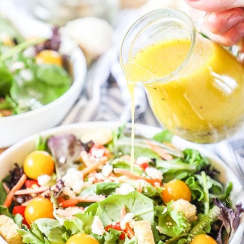 Homemade Lemon Vinaigrette poured over a salad