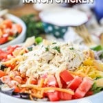 creamy ranch chicken in a bowl with bell pepper lettuce and cheese
