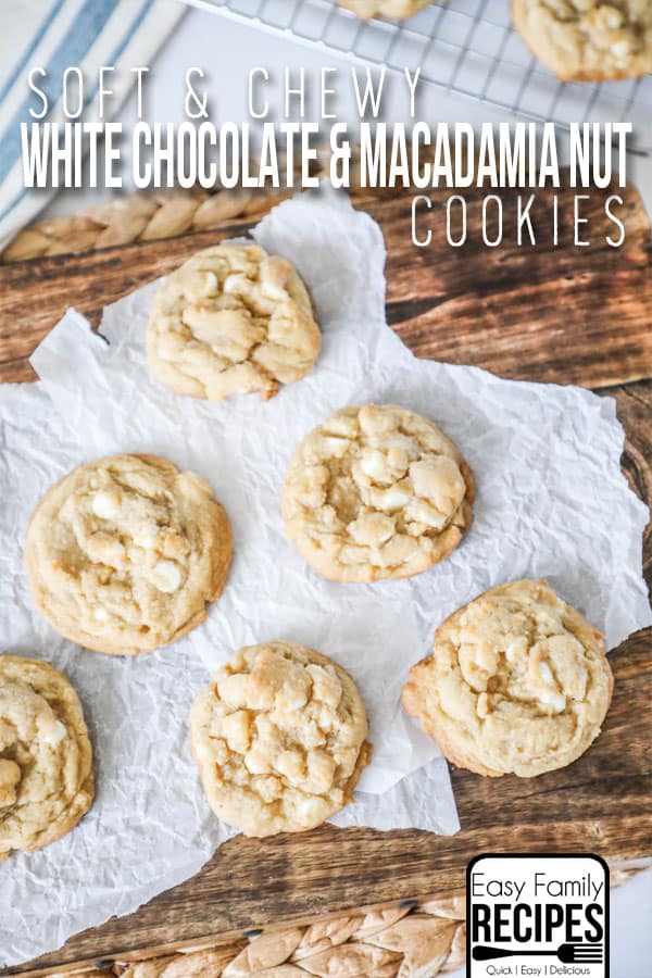 Chewy White Chocolate Macadamia Nut Cookies that are thick and chewy set on parchment