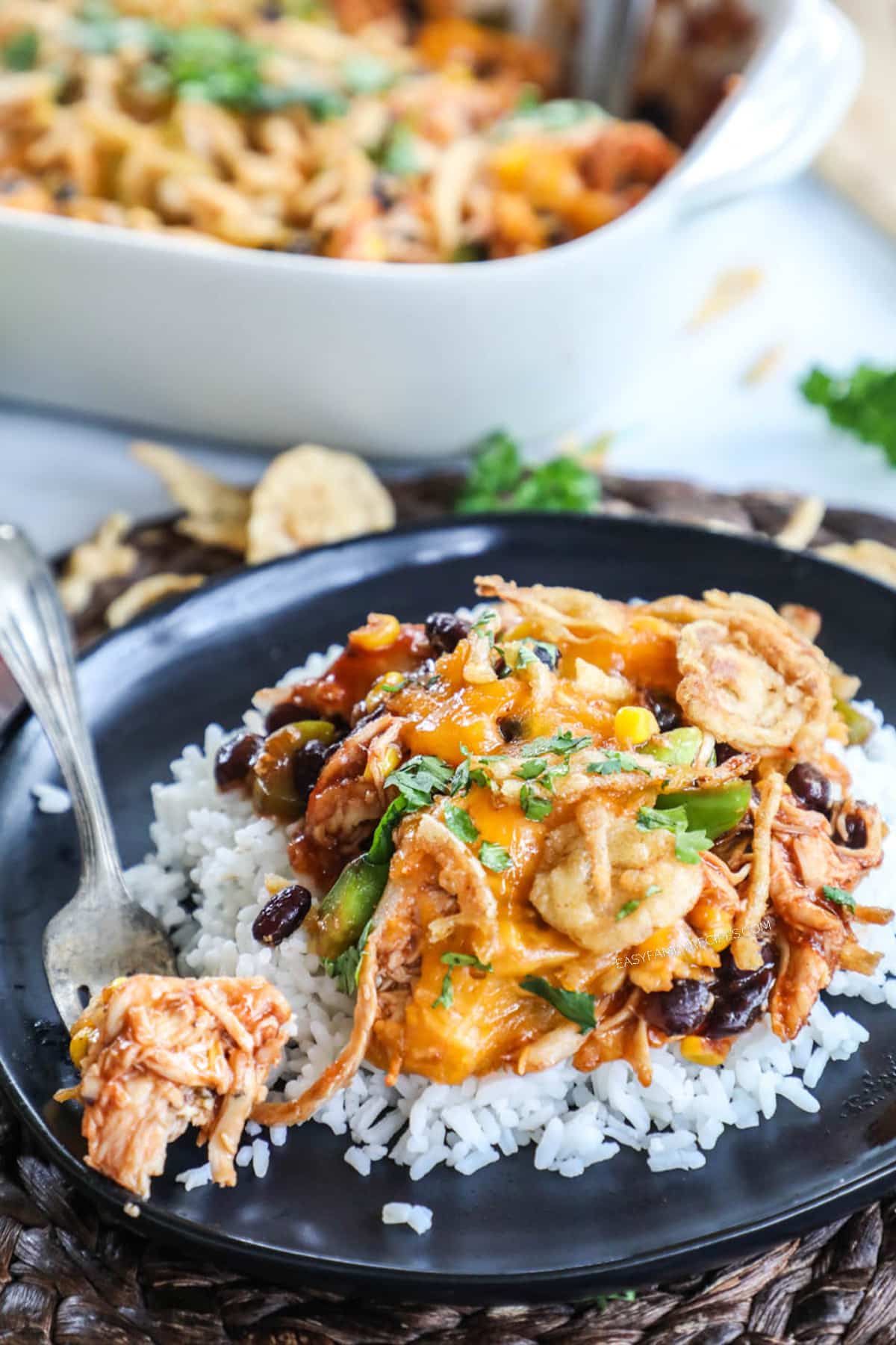 BBQ Chicken Casserole served on a plate over rice.