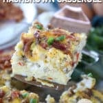 A slice of breakfast casserole on a spatula