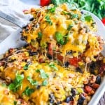 Cowboy Chicken Recipe prepared in Casserole Dish and topped with cheese
