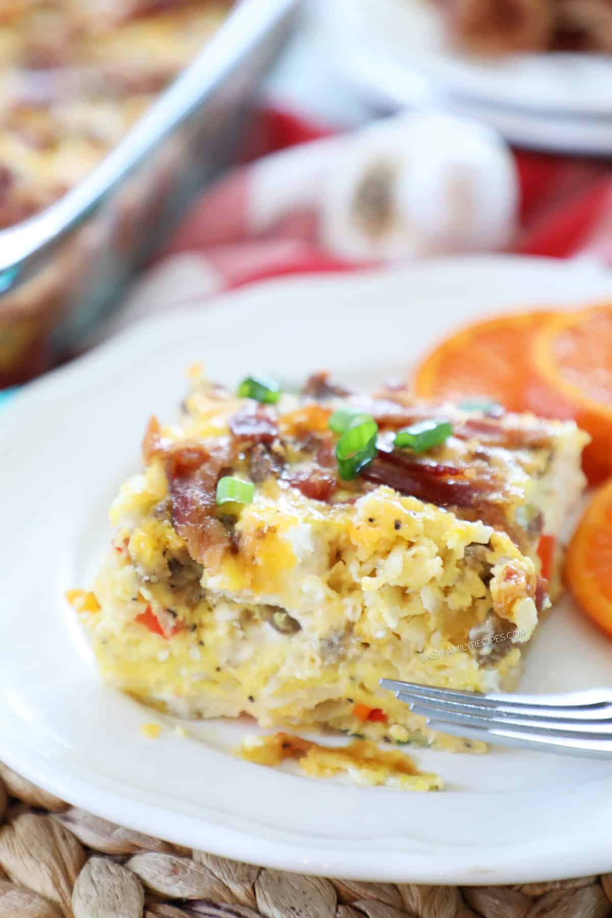 A slice of breakfast casserole on a white plate