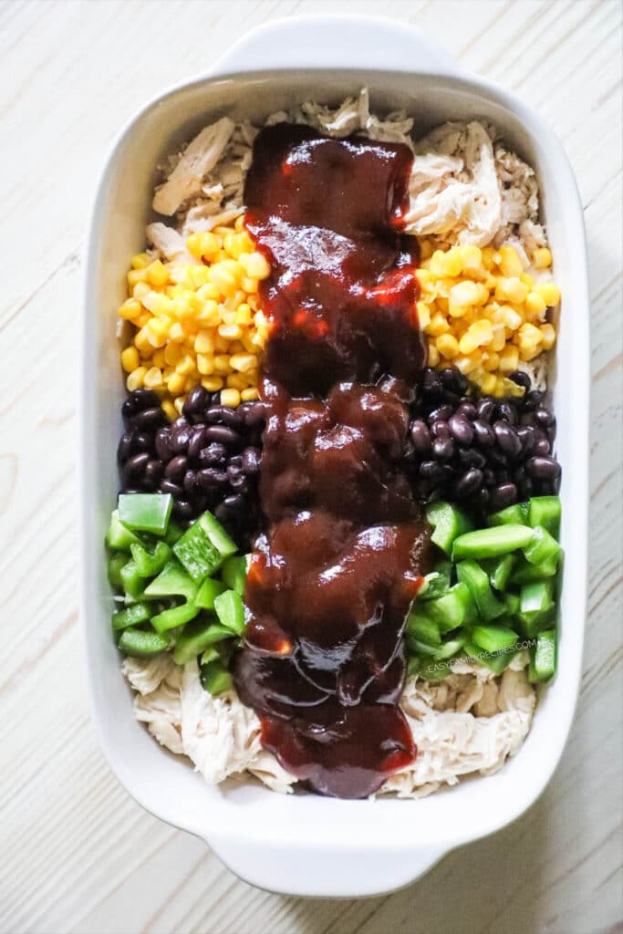 How to make BBQ Chicken Casserole Step 2: Add bell pepper, black beans, corn, and BBQ sauce.