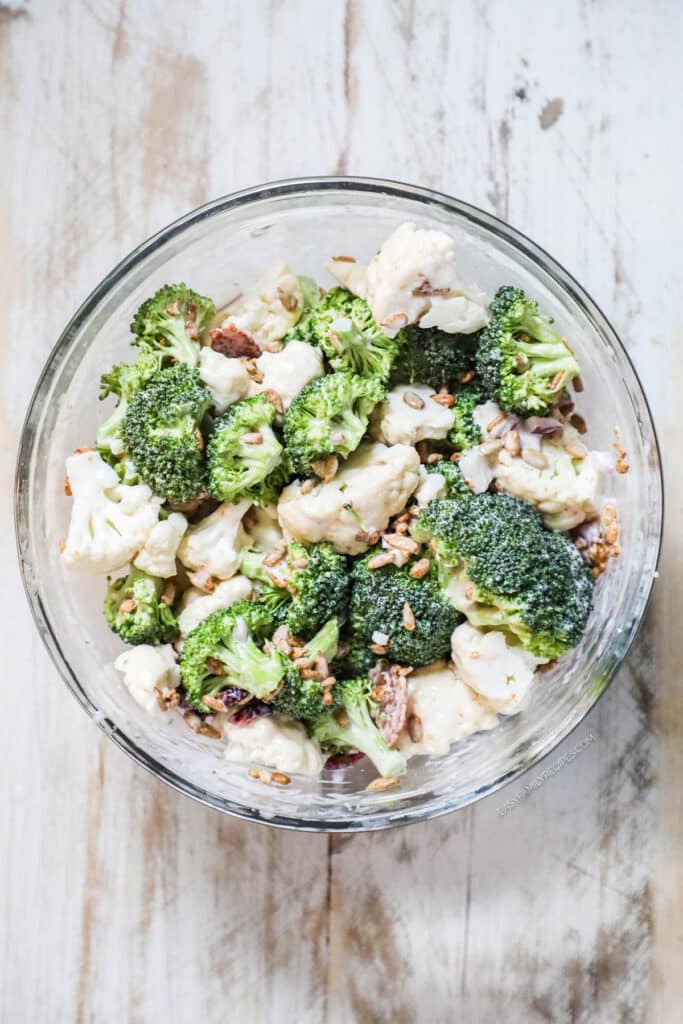 How to make Broccoli Cauliflower Salad step 4: toss broccoli and cauliflower mixture with the dressing to coat.