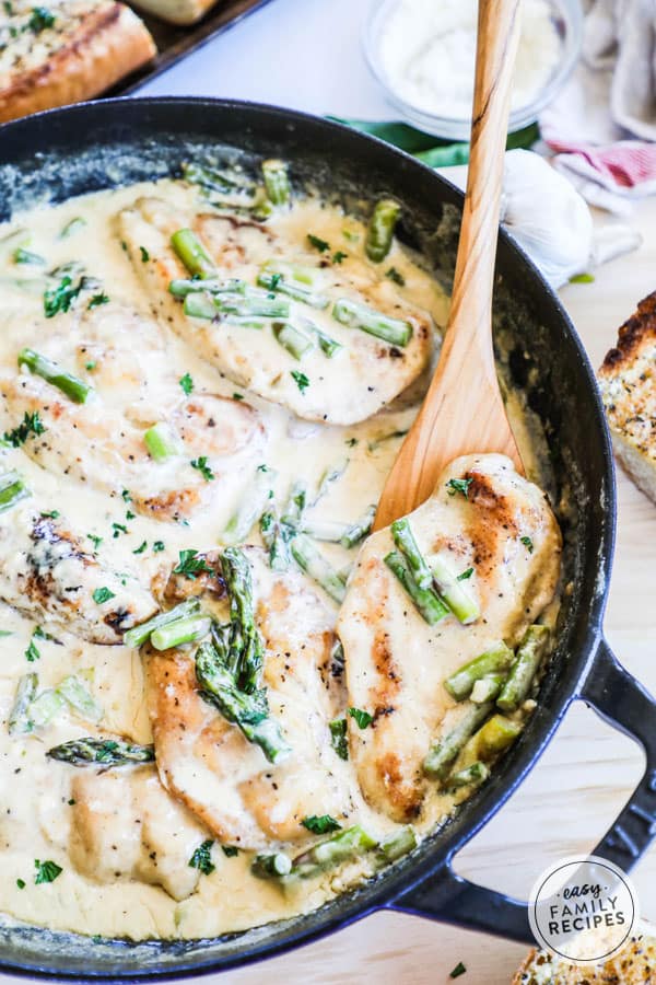 Cast Iron Skillet with rich, creamy, Chicken and Asparagus recipe prepared