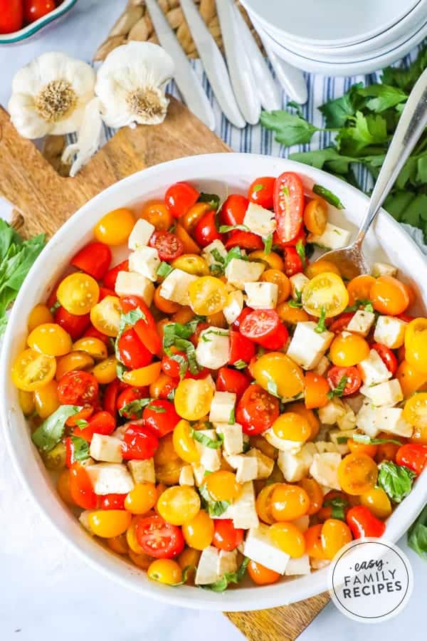 Sweet and savory Tomato Bail Mozzarella Salad.