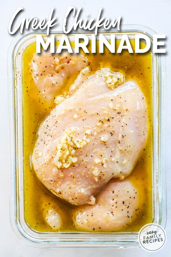Chicken Marinating in Greek Chicken Marinade with garlic and seasonings
