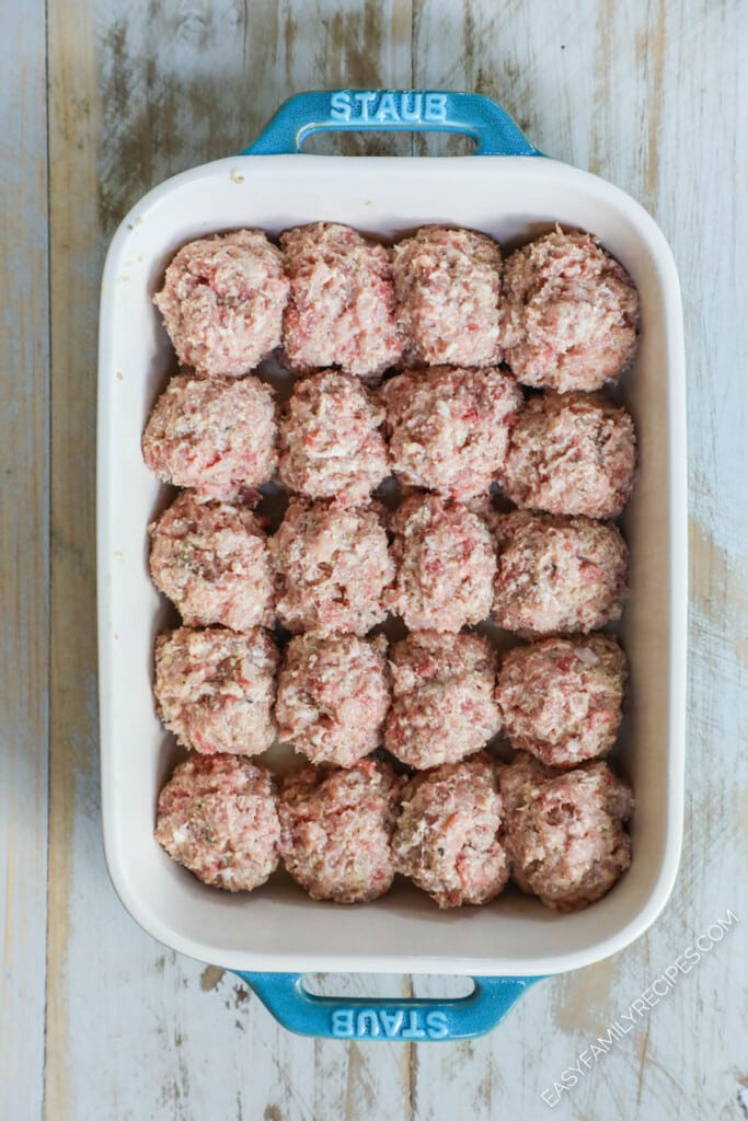 How to make meatballs parmesan Step 3: Place meatballs in a casserole dish.