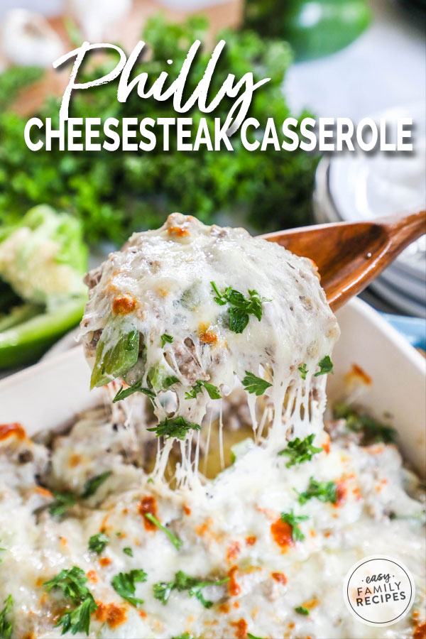 Philly Cheesesteak Casserole being scooped out of casserole dish