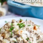 Philly cheesesteak casserole recipe prepared and served on a plate garnished with parsley