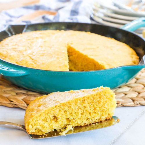 Slice of Homemade Buttermilk Cornbread made in a cast iron skillet