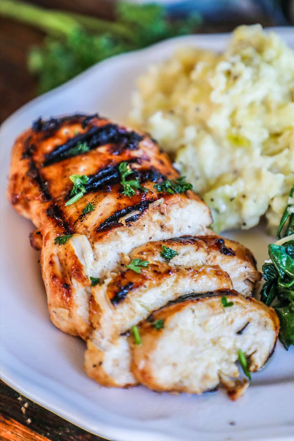 BBQ Marinated Chicken grilled and sliced to show how tender and juicy it is