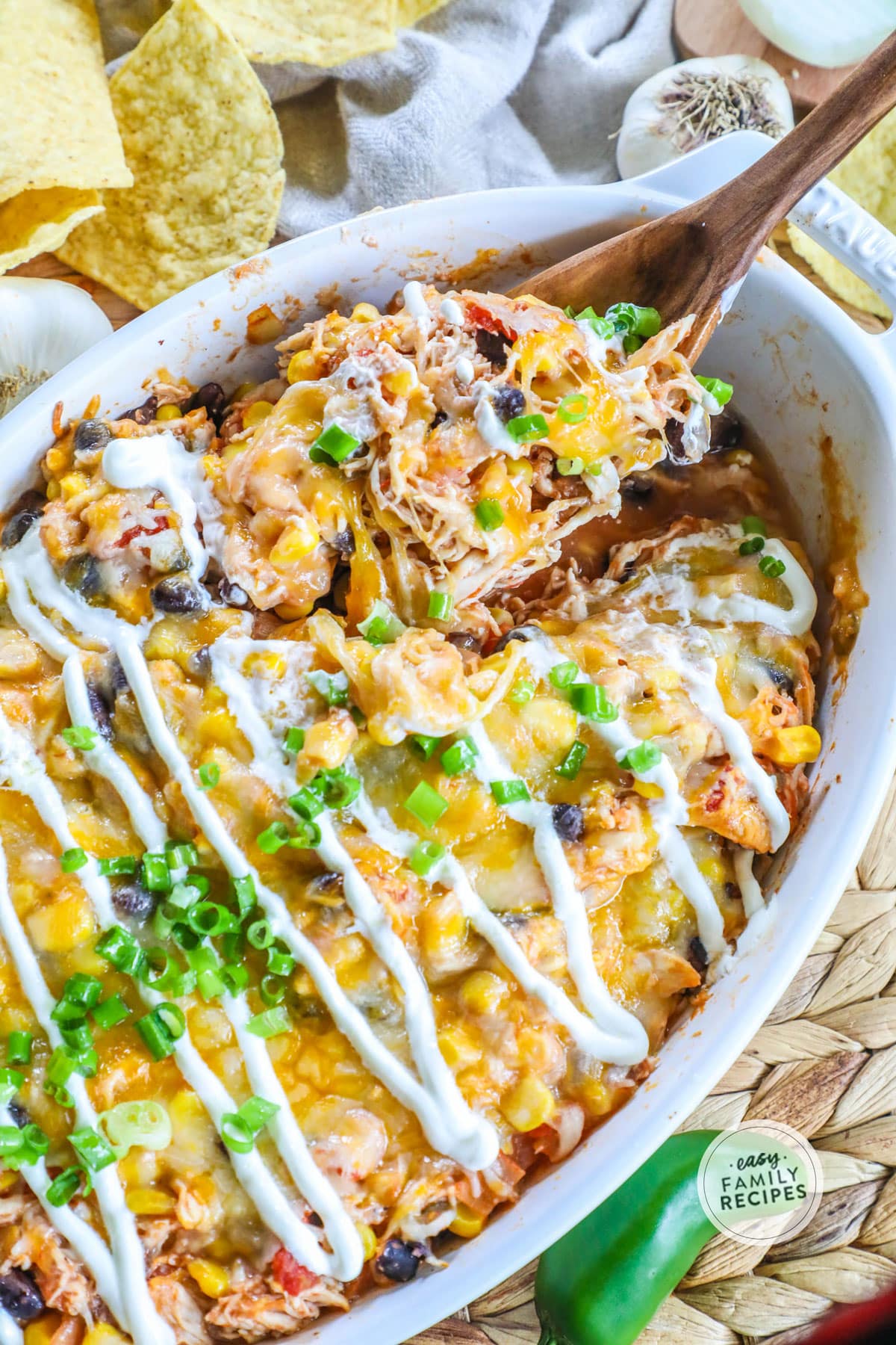 Baked Mexican Chicken Casserole topped with sour cream