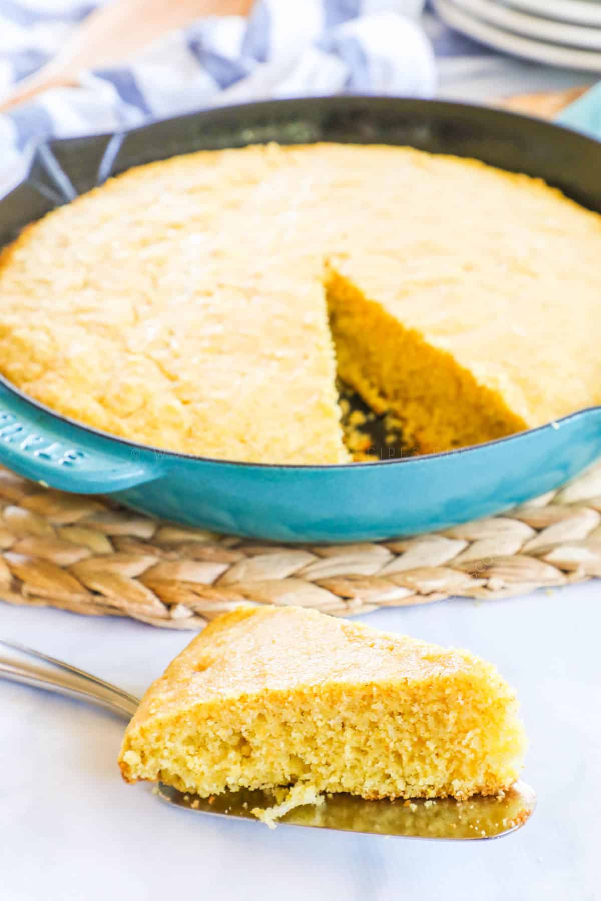 Slice of Homemade Buttermilk Cornbread made in a cast iron skillet