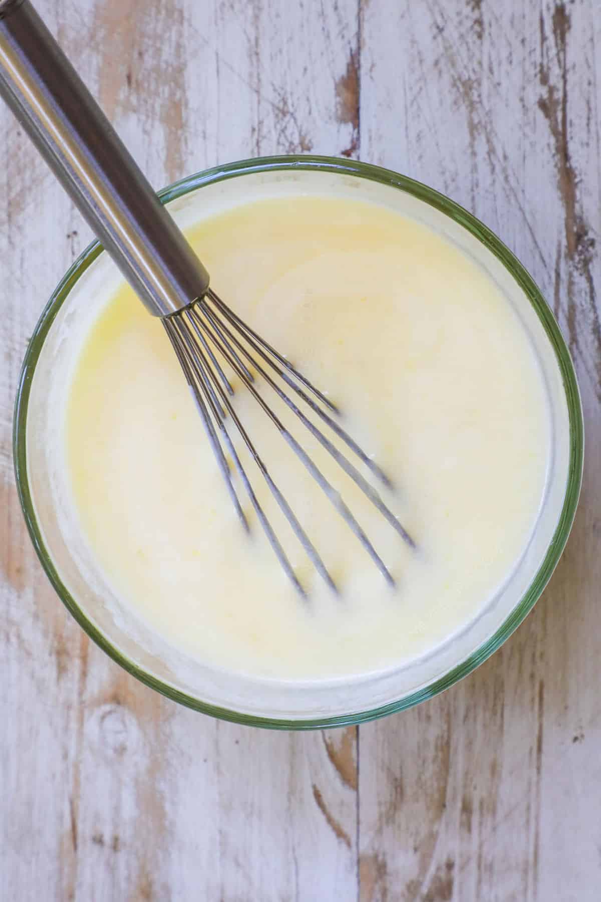 Buttermilk Cornbread Step 2: Whisk the butter, sugar, and eggs. Then add the buttermilk and whisk until smooth.