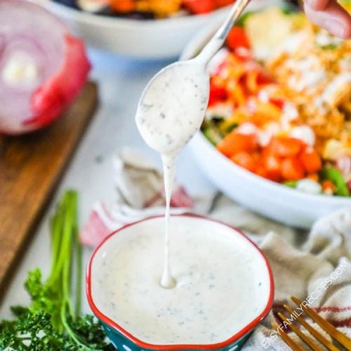 Homemade Ranch Dressing dripping off of a spoon