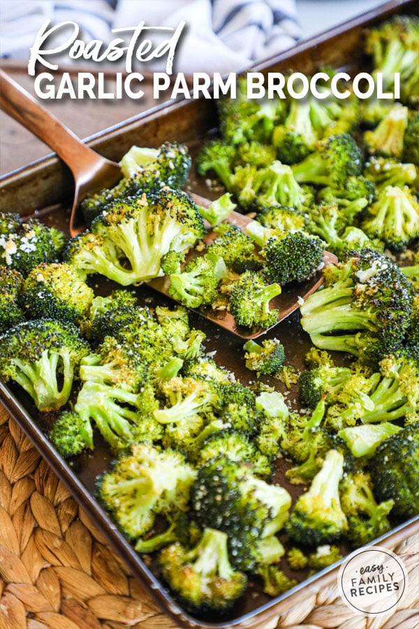 Baked Broccoli with garlic and parmesan cheese on a baking sheet fresh out of the oven.