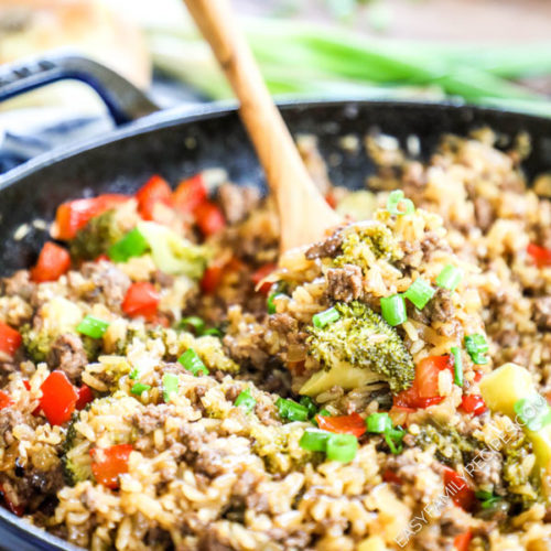 Easy Teriyaki ground beef and rice skillet recipe served with a wooden spoon