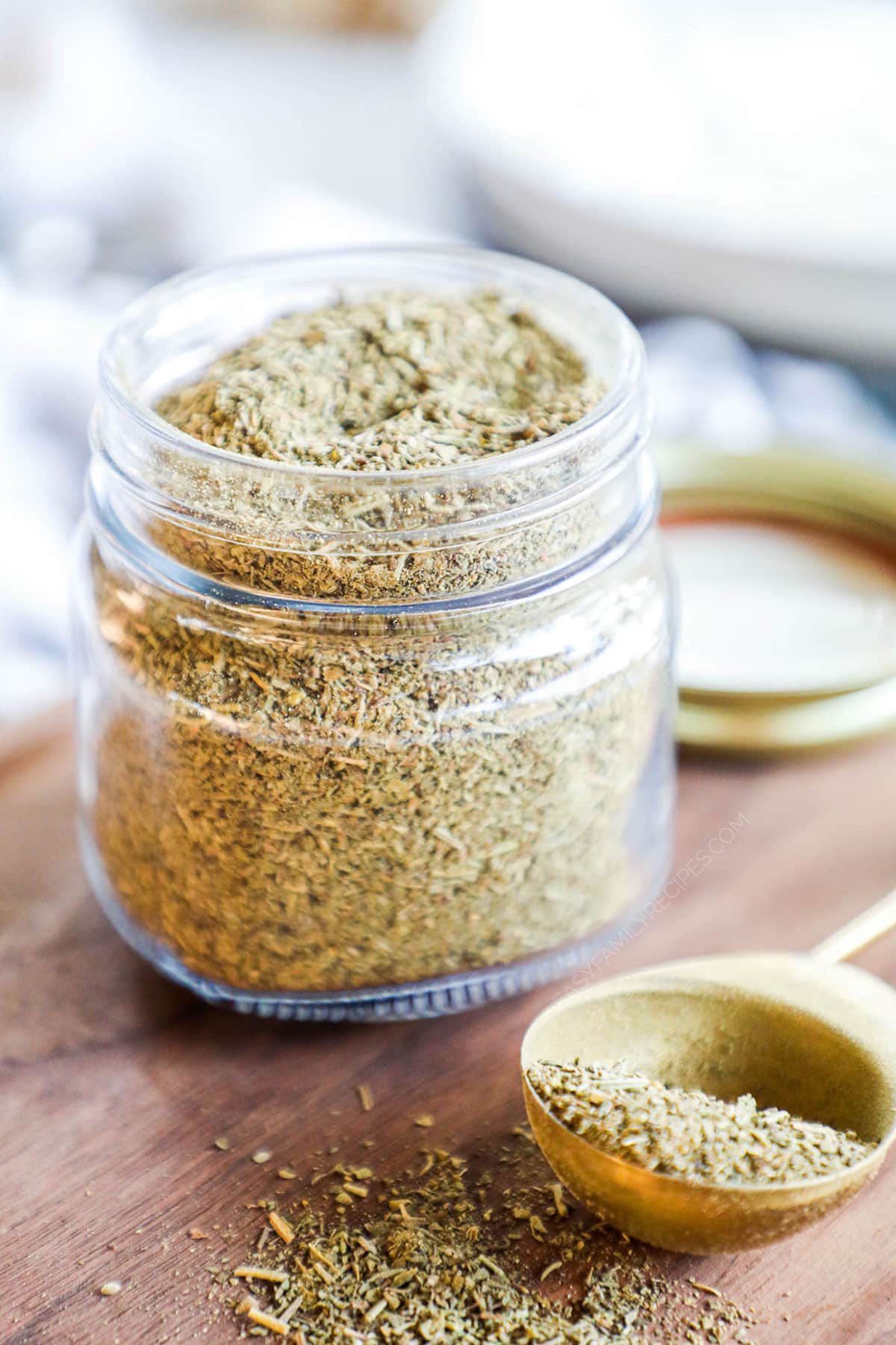 Italian seasonings inside of a spice jar