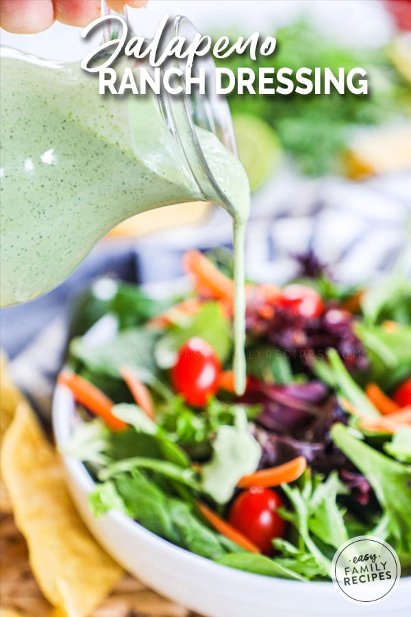 Jalapeno Ranch Dressing being poured onto a salad