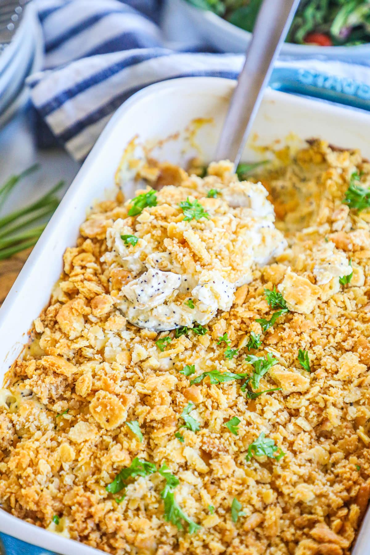 Poppy Seed Chicken Casserole shown with a ritz cracker topping