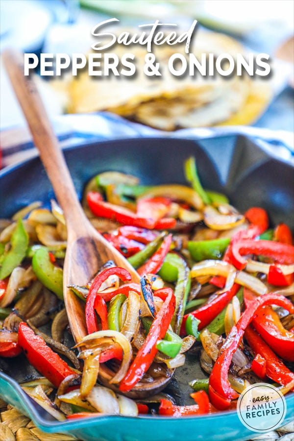 spooning out a serving of sautéed bell peppers and onions