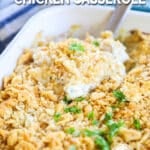 Poppy Seed Chicken being scooped out and shown with a ritz cracker topping