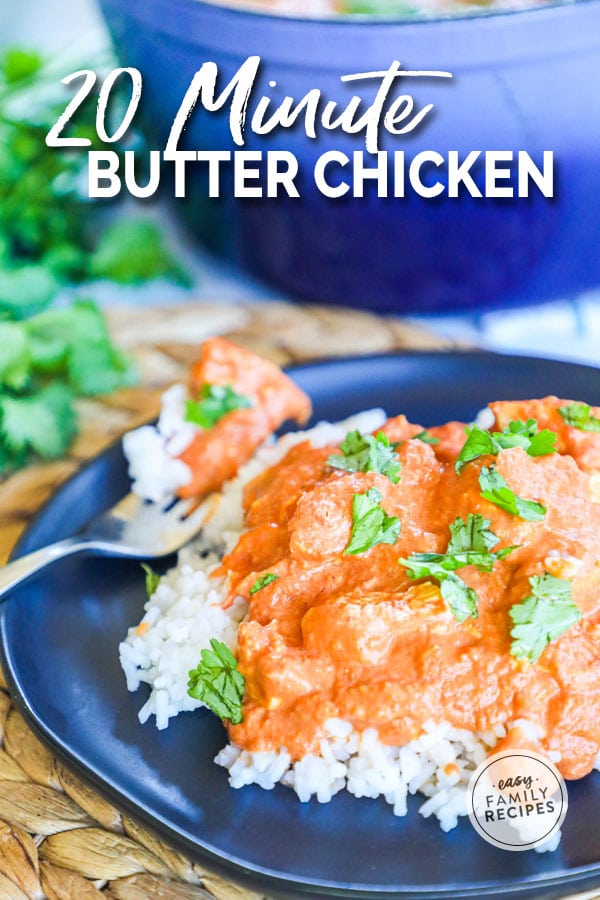 Butter Chicken garnished with cilantro on a plate with a fork