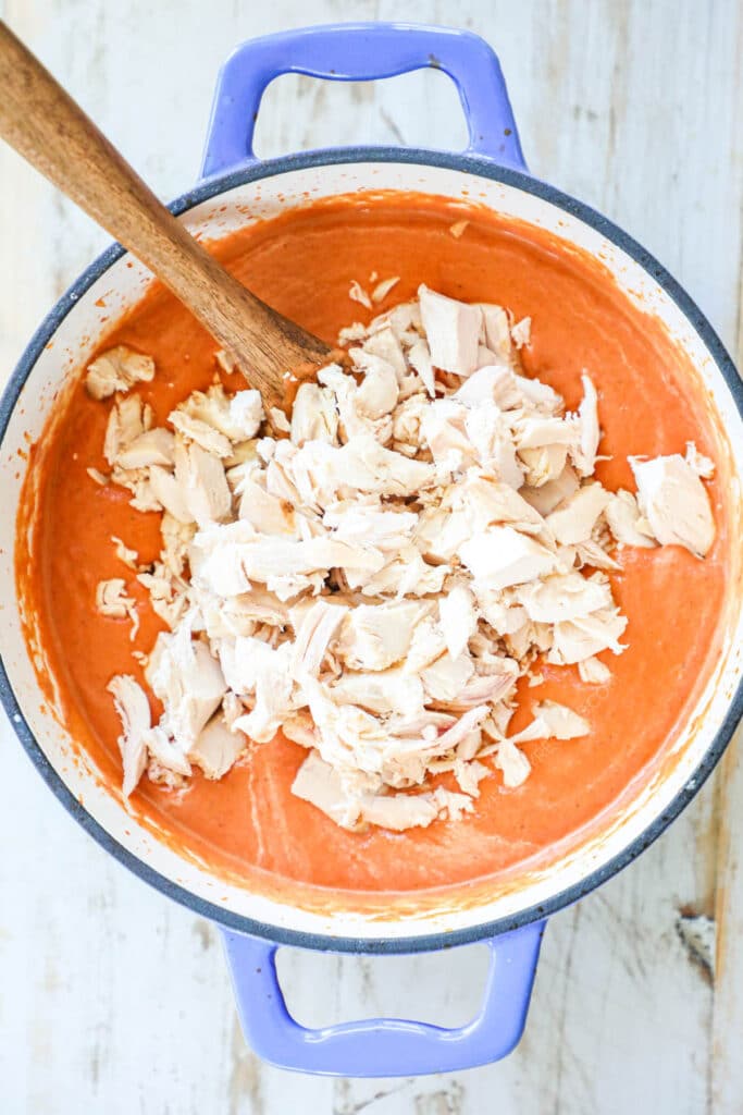 How to make butter chicken step 4: add diced chicken and mix to combine.