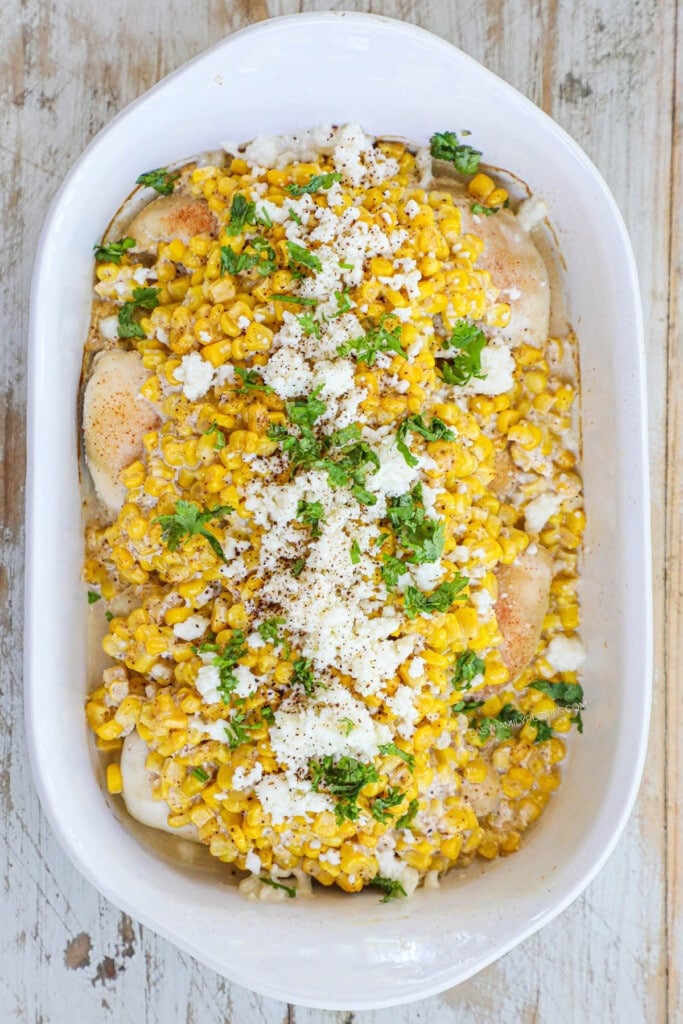How to make Mexican Street Corn Chicken Step 4: Bake chicken until cooked through then top with queso fresco and cilantro.