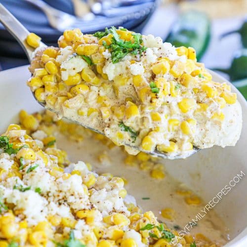 Spatula lifting Chicken breast covered in Mexican Street Corn