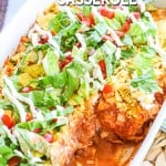 Easy Chicken taco casserole cut so you can see the beans, chicken and cheese inside of the casserole