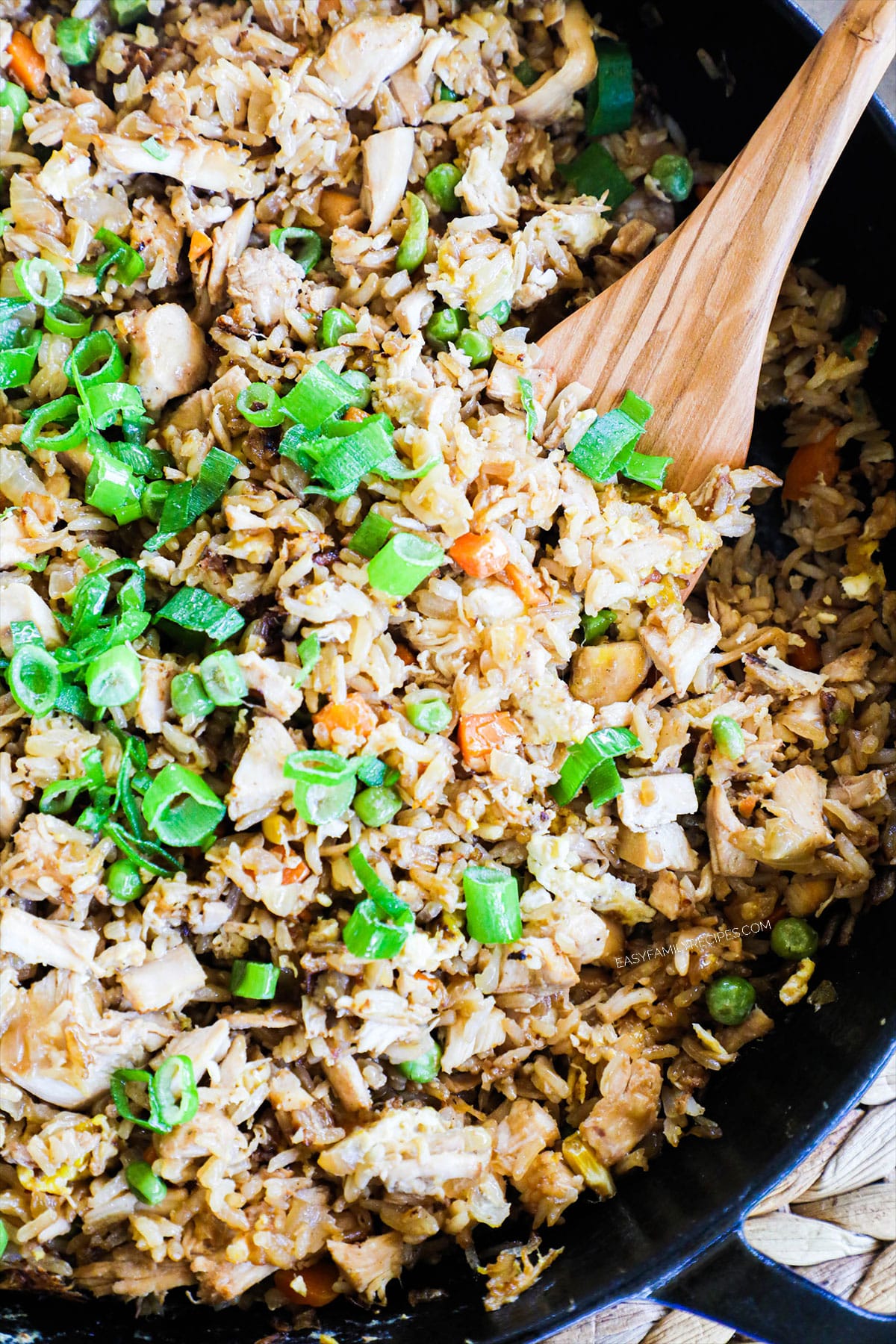 step 4 of chicken fried rice - Garnish with green onions and drizzle with yum yum sauce