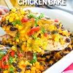 Baked Santa Fe Chicken being lifted out of a casserole dish.