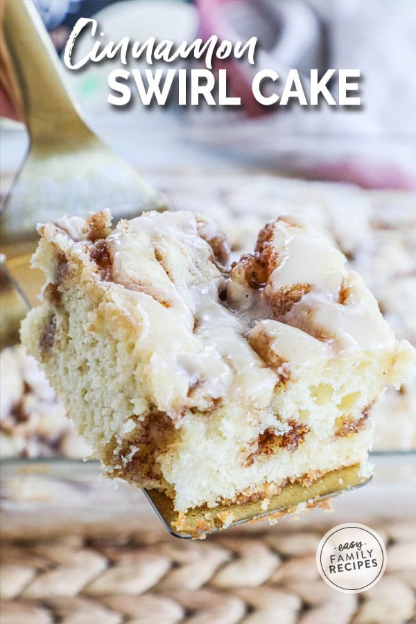 Lifting a slice of cinnamon swirl cake on a spatula