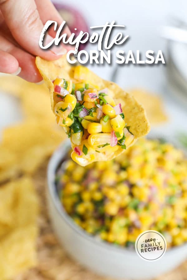 Chip with chipotle corn salsa piled onto it