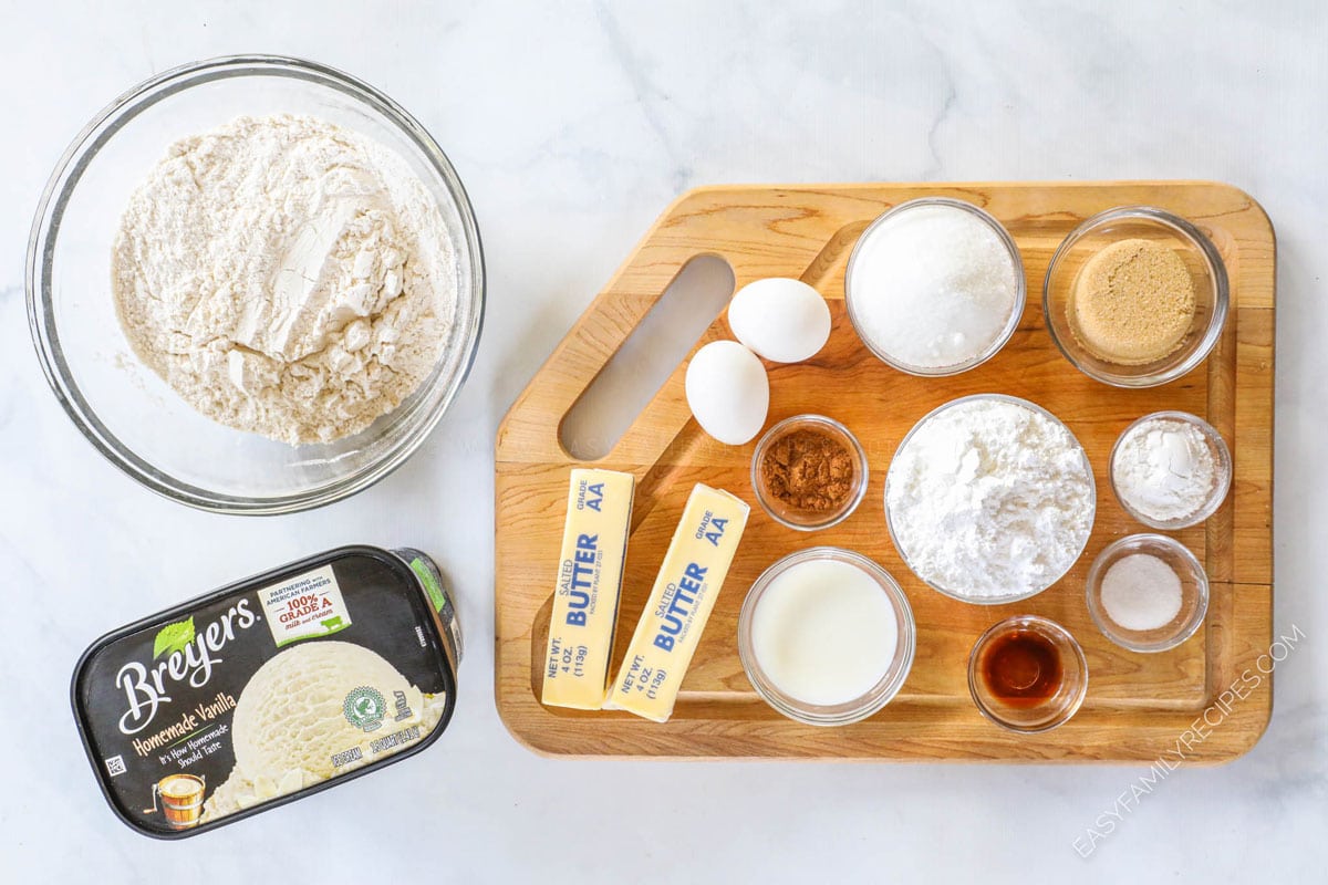 Ingredients for cinnamon swirl cake including flour, sugar, melted ice cream, butter, eggs, salt