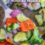 Roasted Vegetables being lifted from pan after baking