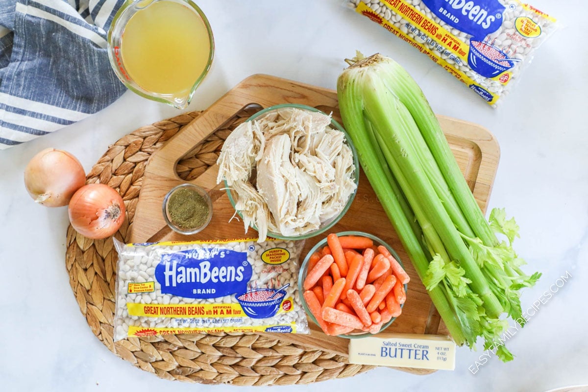 Ingredients for Turkey Bean Soup including leftover turkey, celery, carrots, great northern beans, onion, broth