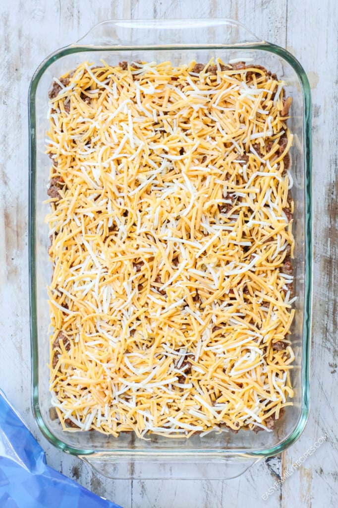 How to make Taco Casserole Step 3: Top with cheese and tortilla chips and bake until warm and crispy.